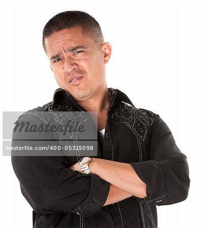 Unimpressed or offended Native American with folded arms on white background