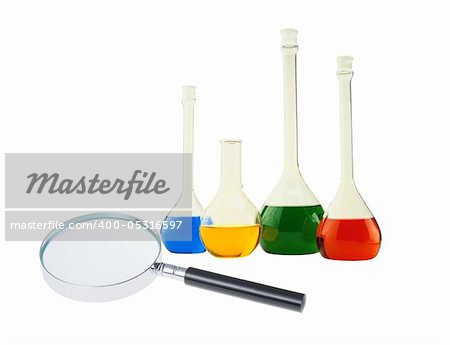 Various tubes and magnifier isolated on the white background