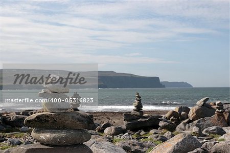 rock piles on the beach in doolin county clare ireland