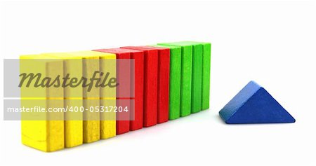 Wooden building blocks on white background. Close Up.