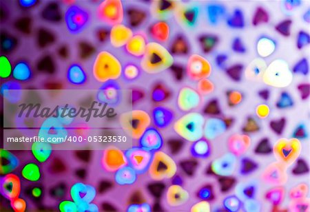 Blurry hearts of colorful decoration lights.