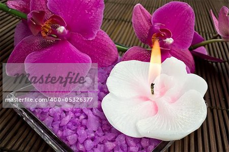 Aroma candle, bath salt and orchid for aromatherapy