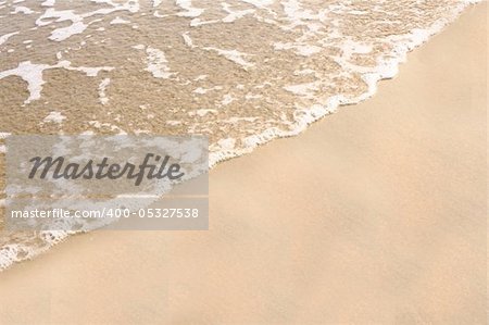 Sand beach water background at day
