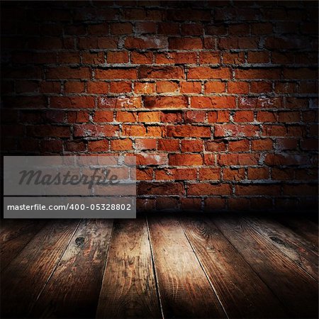 Interior of rural house. Brick wall and wooden floor scene.