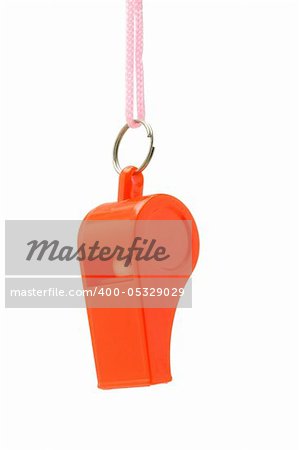 Red plastic whistle suspended on white background