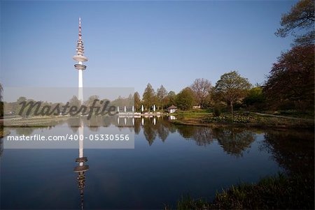 Blue morning with Television Tower Hamburg and lake from Botanic Garden.