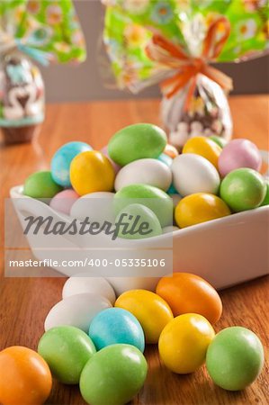 easter eggs on a wooden table with some decoration element