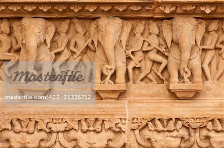 Carved elephants decorating the ancient Lakshmana Hindu Temple at Khajuraho, India. 10th Century AD.