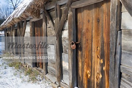 Authentic vintage wooden door on original log cabin