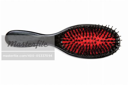 Massage black comb insulated on white background