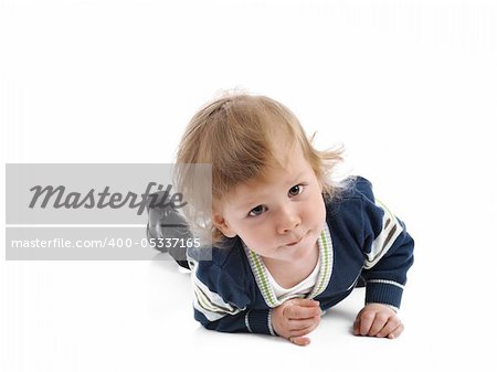 Cute little child smiling on the floor . isolated on white background