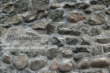 Fragment of a wall laid out from a granite