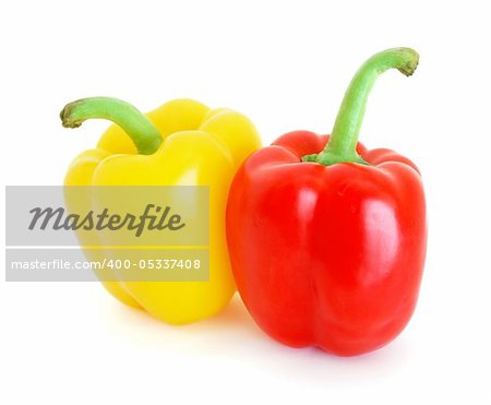Red and yellow bell peppers isolated on white background