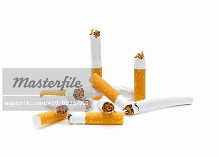 broken cigarette on a white background close-ups. No smoking.