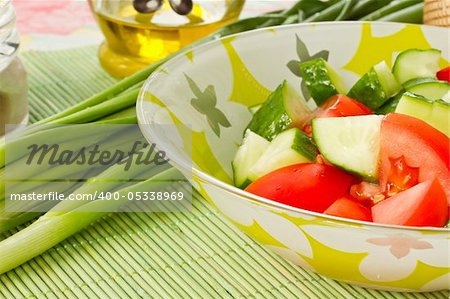 a salad of sliced ??cucumbers and tomatoes