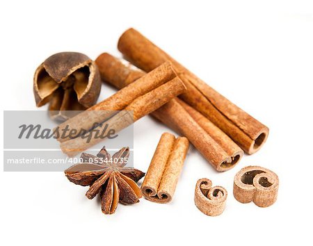 cinnamon and anise isolated on a white background