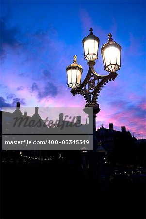 beautiful romantic street lamp at sunset in London