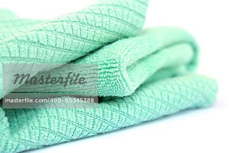 Green rag isolated on white background.