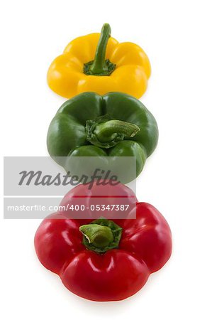 Three pepper bell tops isolated on white background