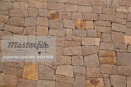 Wall made out of chiseled stacked stones