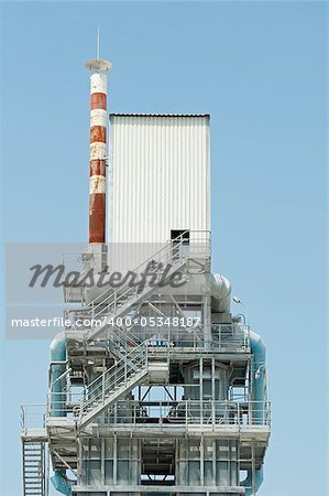 Factory for production of asphalt. Vertical image