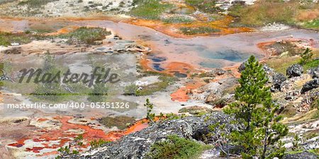 Beautiful colors of the Artist Paint Pots area in Yellowstone National Park - Wyoming.