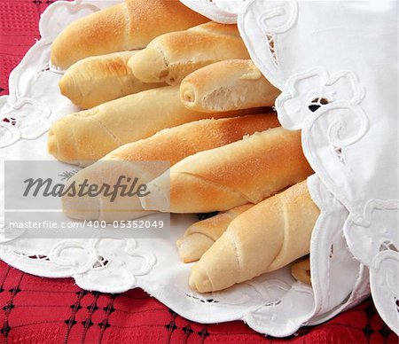 heap of appetizing homemade bread rolled loaves