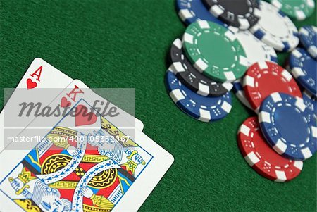 A great poker hand is laid down on the gaming table.