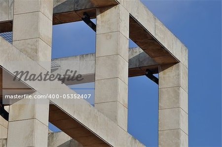 Modern building facade with columns. Abstract architectural structure.