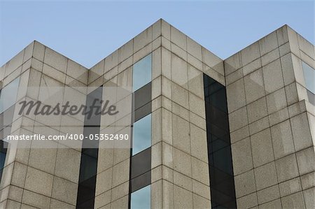 Modern building marble and glass facade corners abstract architecture background.
