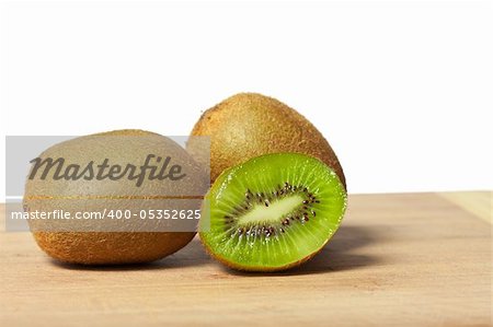 Fresh juicy colorful kiwis on a cutting board