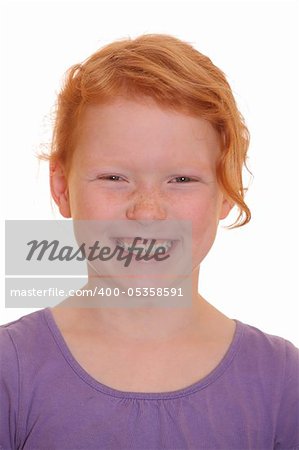 Portrait of a smiling red haired girl
