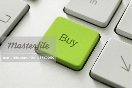 Buy button on the keyboard. Toned Image.