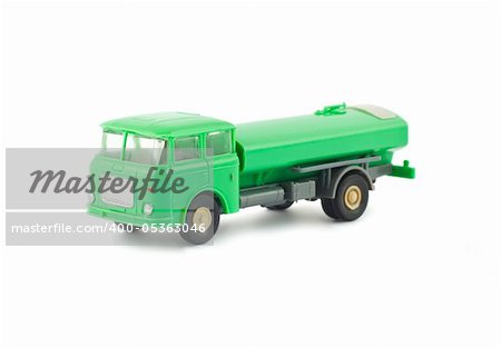Green toy fuel tanker truck isolated on white background