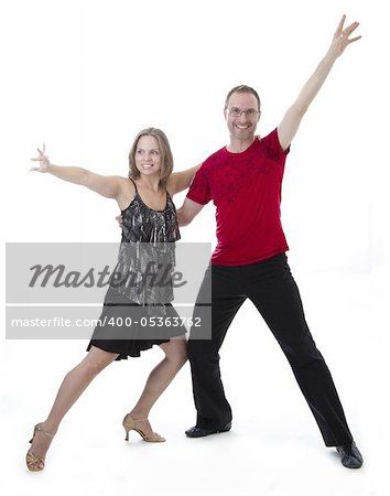 Man and woman dancing salsa against a white background