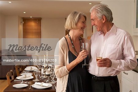 Couple Throwing A Dinner Party