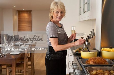 Woman Preparing Food For A Dinner Party