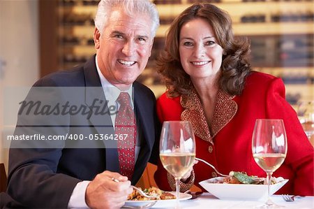 Couple Eating Dinner At A Restaurant