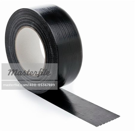 black adhesive tape  on light background. partly unrolled