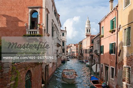 Narrow silent side canal in Venice, Italy