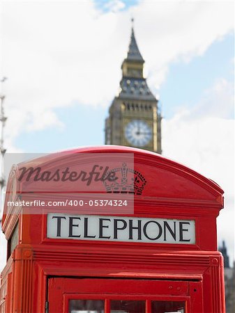 Telephone Booth In Front Of Big Ben Clock Tower, London, England