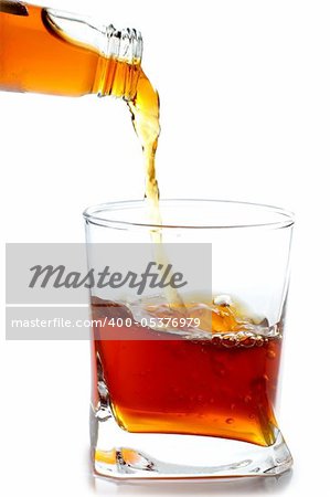 Color photo of a glass of whiskey