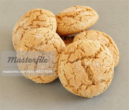 heap of fresh appetizing oatmeal cookies over gray background