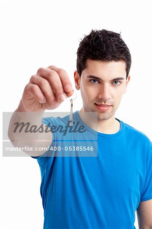 Portrait of a handsome young man holding the keys of your home