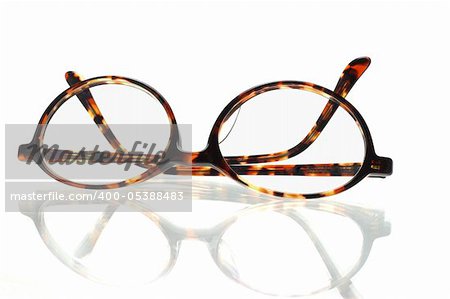 Old fashion plastic frame eyeglasses on white background