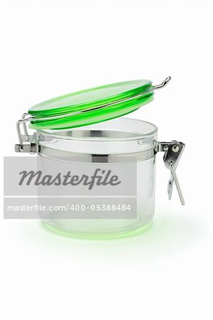 open jar with green cover on white background