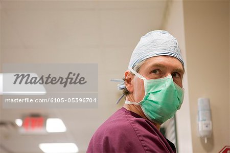 Ophthalmologist preparing for cataract surgery