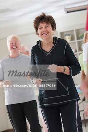 Women doing cardio exercise in a health club