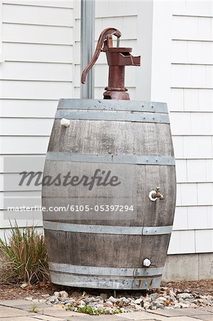 Rain barrel at a Green Technology Home for rainwater harvesting and reuse