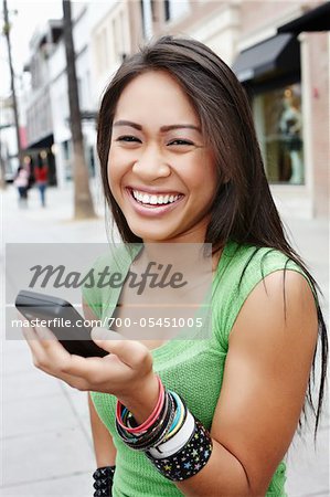 Smiling Woman with Cell Phone Smiling Woman with Cell Phone